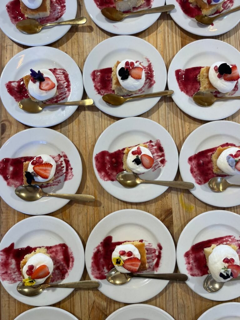 Tresch Les Ches with rose Chantilly cream and topped with fresh berries