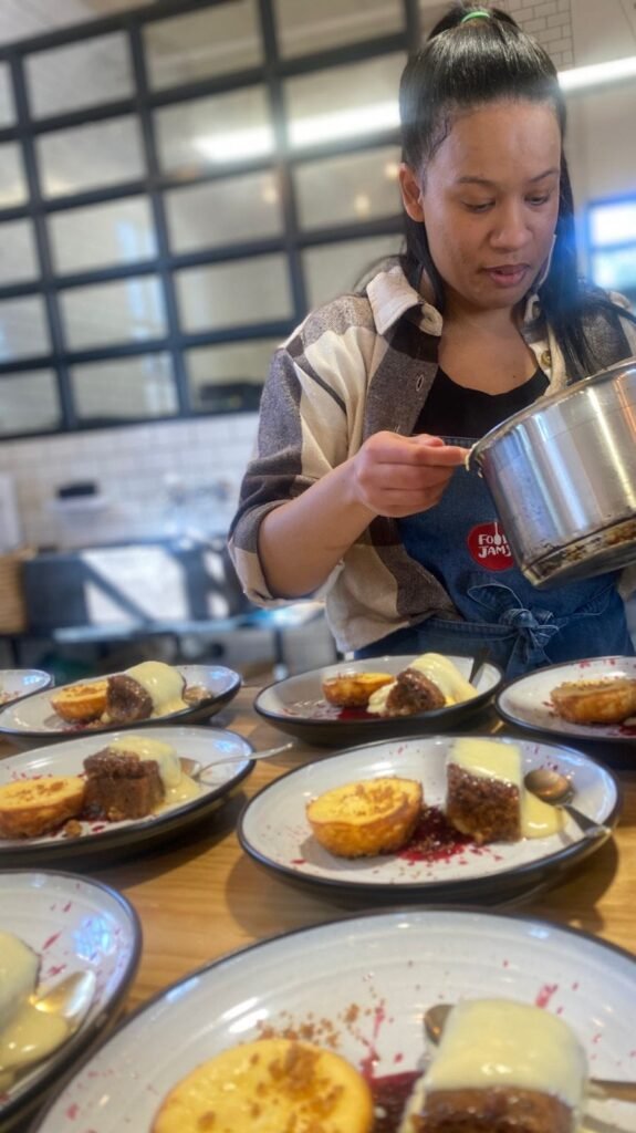Traditional malva pudding, custard,and baked cheesecake with Berry coulis