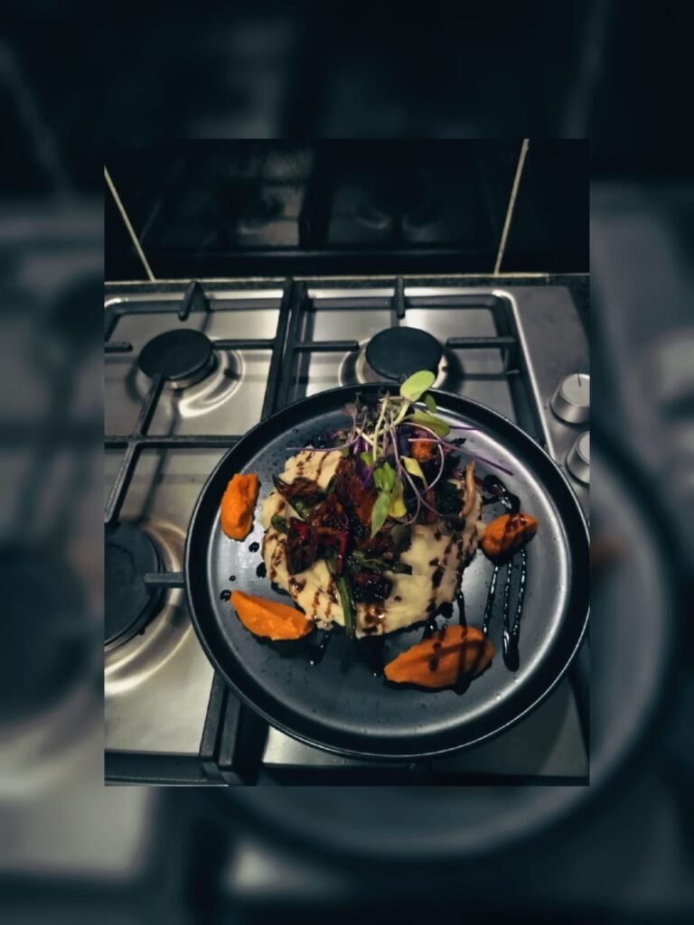 Lamb rack, mash potato, butternut puree and a balsamic reduction